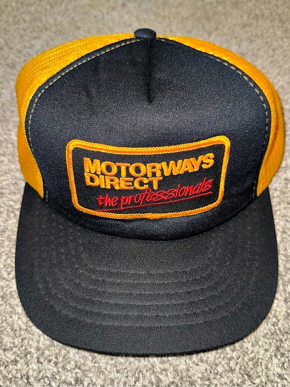 Yupoong Motorways Direct Trucker Hat Black & Orange